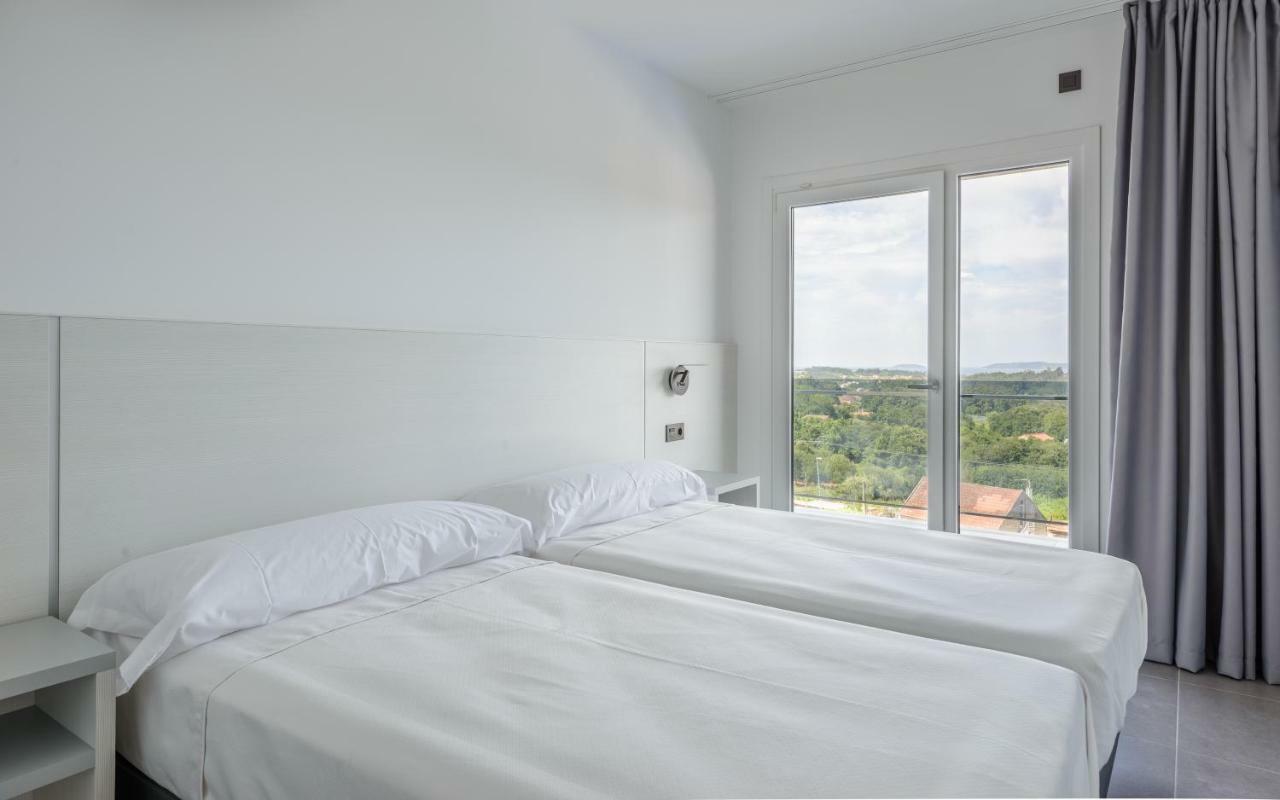 סנשנשו Apartamentos Onzamar מראה חיצוני תמונה